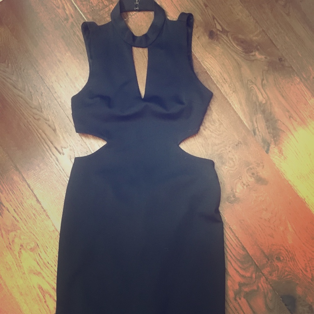 Bebe size L black bodycon dress with cut outs